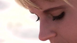 Blonde is flashing her big boobs in the outdoors