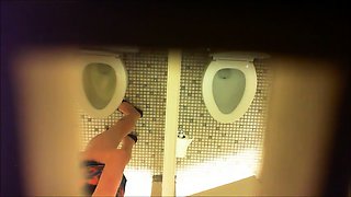 Hidden cam voyeur spying on amateur ladies in the toilet