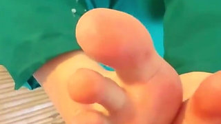 Stepmommy Nurse Gives Stepson a Footjob