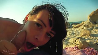 So much cum on my face. Amazing blowjob on the beach
