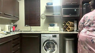 Ebony MILF Moaning and Stripteasing in Kitchen