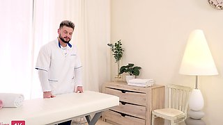 Tattooed blonde with a flexible body fucks after a massage