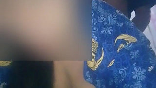 Amateur Footage of a Beautiful Civil Servant Stepmother with an Office Driver in a Warehouse