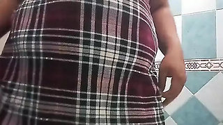 Chubby wife shows you tits and open pussy while changing clothes in the bathroom