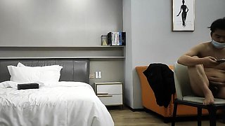 Cute amateur asian web cam girl playing with her toy