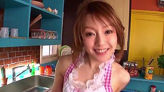 Japanese cutie maid gives a blowjob in the kitchen