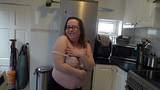 Big Breasts Mom stripping off in kitchen