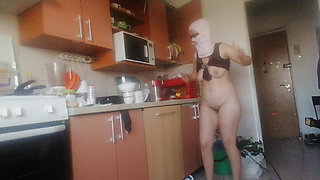 Sexy nude wife preparing food in the kitchen. Hairy brown hair, big ass, big tits