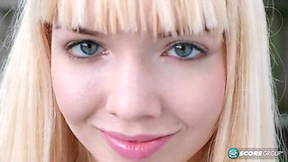 Yoga chick Sveera stretches outside and then loses her yoga clothes, spreads and fingers her snatch.