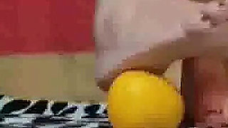 Feet, oranges and high heels