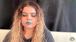 Exotic Goddess with Wild Hair Blows Smoke for You