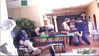 A group of sex-hungry swingers uses roulette as a soft bed for their perversions