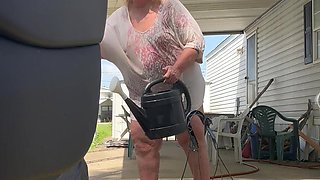Watering Flowers Flashing Tits and Ass