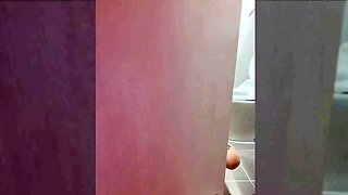 Home alone and horny Asian babe masturbating in the bathroom