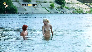 Skinny and young nudist ladies fool around on the beach