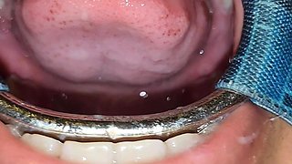 Putting It in Her Pussy and Then Straight Into Her Mouth with a Spider Gag in Her Open Mouth