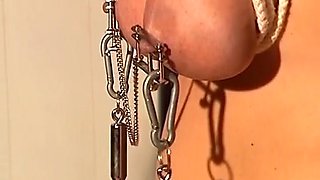 A Brunette German MILF Sucks Two Dicks After BDSM Threesome