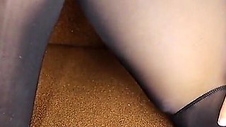 Jerks off his feet. Latex. Cum on legs
