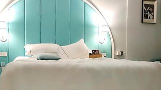 Cute amateur asian web cam girl playing with her toy