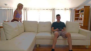 Blonde beauty Brit Blair gives a handjob to her boyfriend