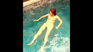 Natalia La Sumisa, a mature submissive in the pool, getting fucked in the ass after seeing her clients.