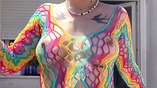 Smoking in a Rainbow Fishnet on the Balcony