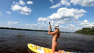 Big-Ass Blonde's Naked Walk on a Paddleboard