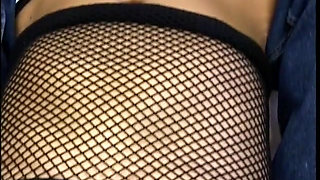 African brunette in fishnets loves jacking jizz off