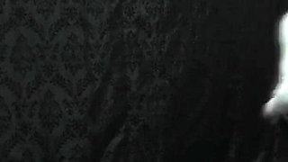 Under Nomi's Black Nike Sneakers