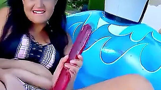 Step brother catches college stepsister Carmina masturbating in the pool and helps her