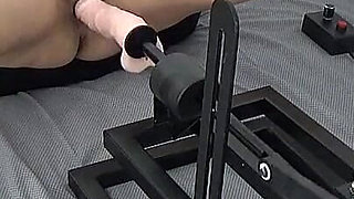 A Mature MILF Masturbates with a Sex Machine