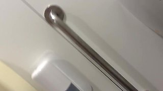 Steamy Airport Bathroom Encounter Ends in Intense Finish