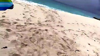 Big breasted MILF housewife posing naked on the beach