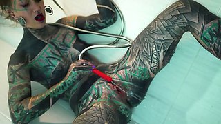 Tattooed Beauty Destroys Her Ass with Toys in Steamy Shower Masturbation