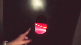 Sucking for the First Time a Cock Through Gloryhole