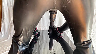 Dominatrix mistress April rubber slave punishment