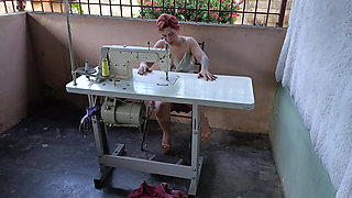 While Pedaling a Sewing Machine, It Gets Stuck, and She Receives Some Unexpected Help