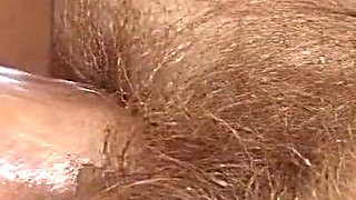 Busty Mature Brunette Rides Hard in Steamy Amateur Session