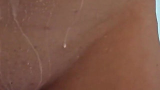 Two Busty MILFs Play with Each Other and Pour Milk Over Each Other's Bodies in the Bathtub.