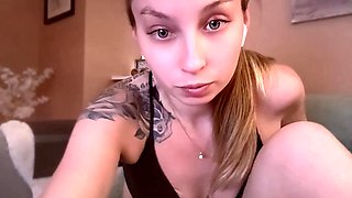 Tattooed Babe Teases in Black Lingerie: Sensual Solo Play