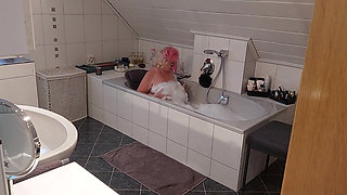 Mature Tgirl Stroking Throbbing Cock in Bubbly Tub Climax