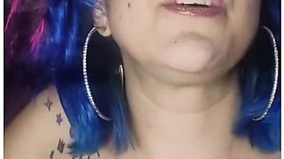 Close-up lips wrapped around a cigarette, smoke curling in the air