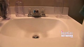 Coed with glasses uses crimson sex toy and pees