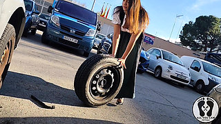 Dirndl Slut Gets Dirty and Oily Changing Tires