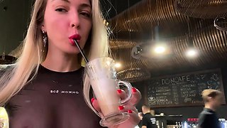 Braless walk in city. Flashing piercing nipples in public.