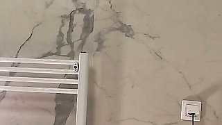 Amazingly Beautiful Hot Brunette Babe in the Bathroom Takes Her Thong off Under White Mini Tennis Skirt to Flash Shaved Pussy