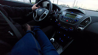 Amateur MILF in jeans and nylon socks gives a taxi driver a footjob