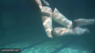 Shaved brunette sissy Irina Polcharova naked in the pool