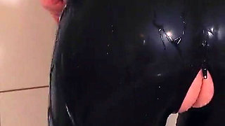 Sexy Latex Model with Curvy Body Rubber Erotic Teasing..