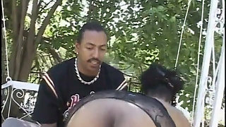 Thick black freak rides throbbing pecker until busting a nut on face